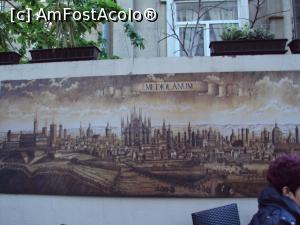 [P10] Reproducere agăţată pe peretele terasei restaurantului: Mediolanum - Milano în secolul al XVII-lea.  » foto by Carmen Ion
 - 
<span class="allrVoted glyphicon glyphicon-heart hidden" id="av730756"></span>
<a class="m-l-10 hidden" id="sv730756" onclick="voting_Foto_DelVot(,730756,4083)" role="button">șterge vot <span class="glyphicon glyphicon-remove"></span></a>
<a id="v9730756" class=" c-red"  onclick="voting_Foto_SetVot(730756)" role="button"><span class="glyphicon glyphicon-heart-empty"></span> <b>LIKE</b> = Votează poza</a> <img class="hidden"  id="f730756W9" src="/imagini/loader.gif" border="0" /><span class="AjErrMes hidden" id="e730756ErM"></span>