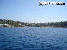 [P06] Un mic port iar în dreapta (cu umbreluțe roșii) una dintre puținele porțiuni de plajă cu nisip. » foto by Utube
 - 
<span class="allrVoted glyphicon glyphicon-heart hidden" id="av147095"></span>
<a class="m-l-10 hidden" id="sv147095" onclick="voting_Foto_DelVot(,147095,4692)" role="button">șterge vot <span class="glyphicon glyphicon-remove"></span></a>
<a id="v9147095" class=" c-red"  onclick="voting_Foto_SetVot(147095)" role="button"><span class="glyphicon glyphicon-heart-empty"></span> <b>LIKE</b> = Votează poza</a> <img class="hidden"  id="f147095W9" src="/imagini/loader.gif" border="0" /><span class="AjErrMes hidden" id="e147095ErM"></span>