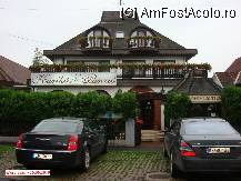 [P01] Restaurantul Karikas ( Etterem ) - parcarea din strada Hőforrás şi intrarea-n restaurant din stradă. » foto by creivean
 - 
<span class="allrVoted glyphicon glyphicon-heart hidden" id="av86908"></span>
<a class="m-l-10 hidden" id="sv86908" onclick="voting_Foto_DelVot(,86908,6135)" role="button">șterge vot <span class="glyphicon glyphicon-remove"></span></a>
<a id="v986908" class=" c-red"  onclick="voting_Foto_SetVot(86908)" role="button"><span class="glyphicon glyphicon-heart-empty"></span> <b>LIKE</b> = Votează poza</a> <img class="hidden"  id="f86908W9" src="/imagini/loader.gif" border="0" /><span class="AjErrMes hidden" id="e86908ErM"></span>