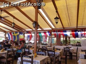 [P08] Mese şi steaguri la taverna Symposio » foto by irinad
 - 
<span class="allrVoted glyphicon glyphicon-heart hidden" id="av821834"></span>
<a class="m-l-10 hidden" id="sv821834" onclick="voting_Foto_DelVot(,821834,8082)" role="button">șterge vot <span class="glyphicon glyphicon-remove"></span></a>
<a id="v9821834" class=" c-red"  onclick="voting_Foto_SetVot(821834)" role="button"><span class="glyphicon glyphicon-heart-empty"></span> <b>LIKE</b> = Votează poza</a> <img class="hidden"  id="f821834W9" src="/imagini/loader.gif" border="0" /><span class="AjErrMes hidden" id="e821834ErM"></span>