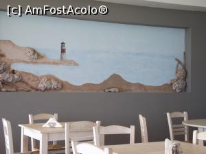 [P23] Un decor de pe terasa restaurantului Cephalonia Palace. Textul de pe perete este foarte sugestiv » foto by irinad
 - 
<span class="allrVoted glyphicon glyphicon-heart hidden" id="av859587"></span>
<a class="m-l-10 hidden" id="sv859587" onclick="voting_Foto_DelVot(,859587,14638)" role="button">șterge vot <span class="glyphicon glyphicon-remove"></span></a>
<a id="v9859587" class=" c-red"  onclick="voting_Foto_SetVot(859587)" role="button"><span class="glyphicon glyphicon-heart-empty"></span> <b>LIKE</b> = Votează poza</a> <img class="hidden"  id="f859587W9" src="/imagini/loader.gif" border="0" /><span class="AjErrMes hidden" id="e859587ErM"></span>